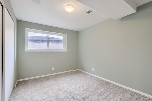 unfurnished bedroom featuring carpet floors