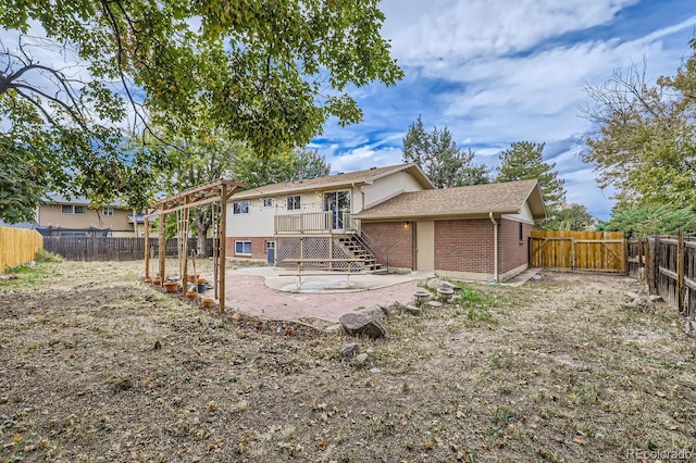 rear view of property with a patio