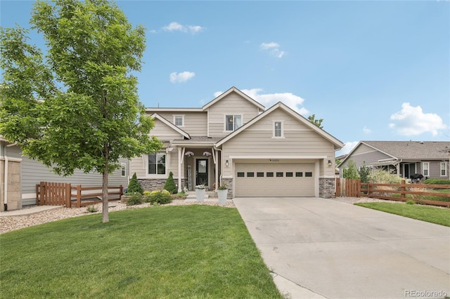 16226 W 94th Dr, Arvada, CO 80007 - view of front of house with stone siding and driveway