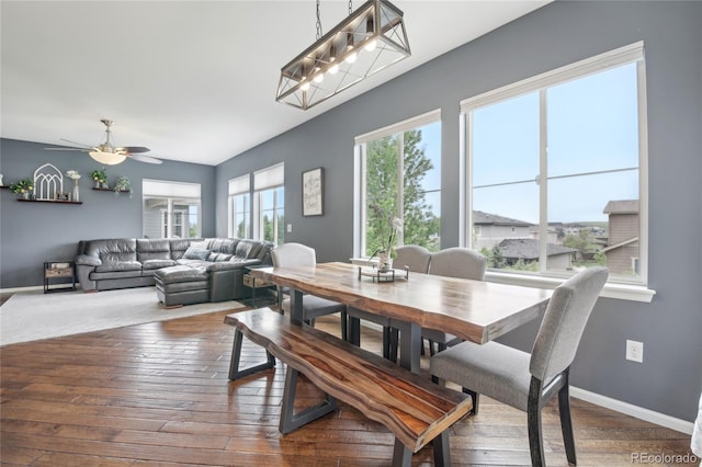 16226 W 94th Dr, Arvada, CO 80007 - dining space with dark wood-type flooring, baseboards, and ceiling fan