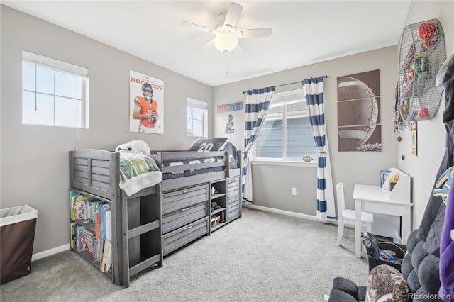 16226 W 94th Dr, Arvada, CO 80007 - carpeted bedroom with baseboards and ceiling fan