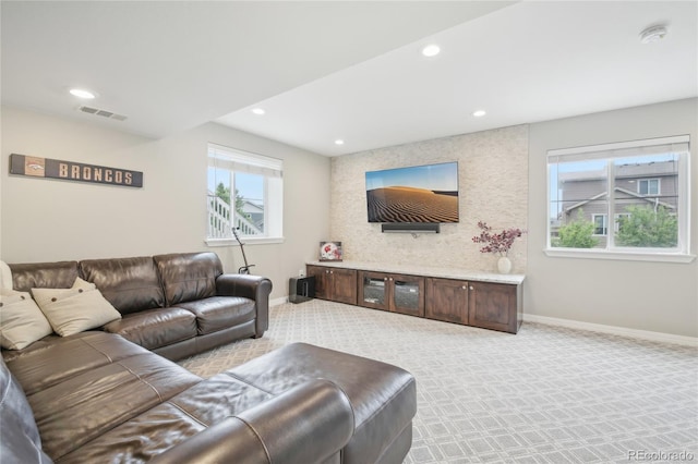 16226 W 94th Dr, Arvada, CO 80007 - living room with baseboards, recessed lighting, and light colored carpet