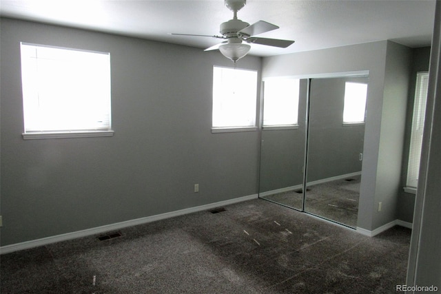 14503 E Wagon Trail Dr, Aurora, CO 80015 - unfurnished bedroom with carpet floors, a closet, baseboards, and ceiling fan