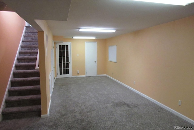 14503 E Wagon Trail Dr, Aurora, CO 80015 - finished basement featuring stairway, carpet, and baseboards