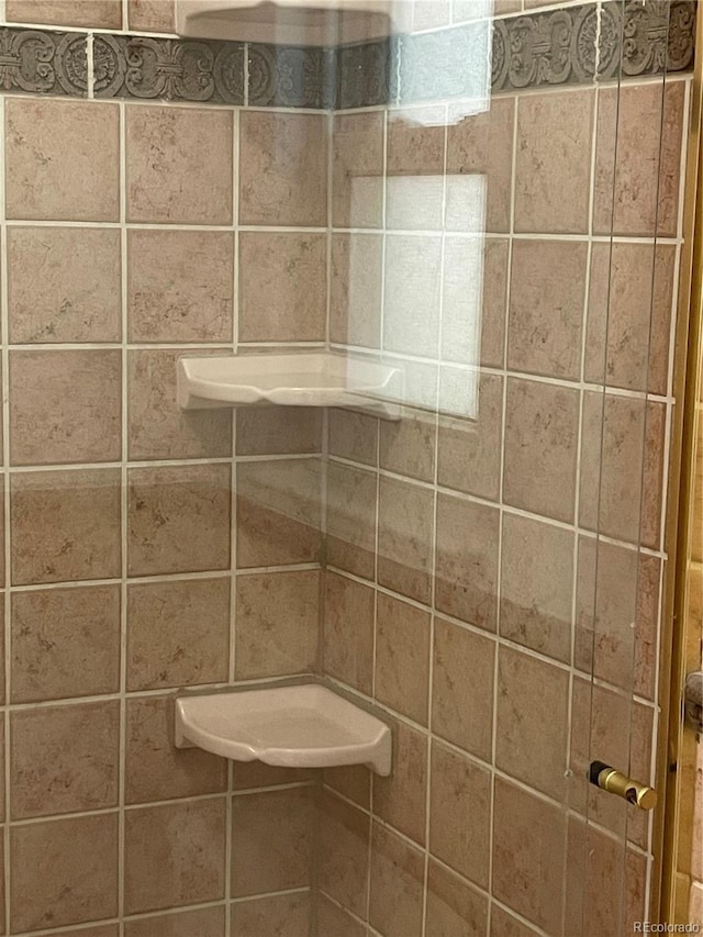 14503 E Wagon Trail Dr, Aurora, CO 80015 - full bathroom with a tile shower