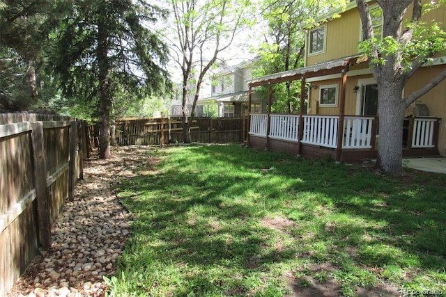 14503 E Wagon Trail Dr, Aurora, CO 80015 - view of yard featuring a wooden deck