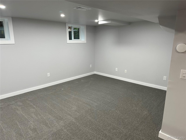 2201 Lima St, Aurora, CO 80010 - basement with baseboards, visible vents, dark colored carpet, and recessed lighting