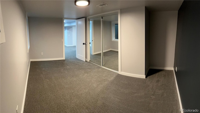 2201 Lima St, Aurora, CO 80010 - unfurnished bedroom with carpet flooring, a closet, baseboards, and visible vents