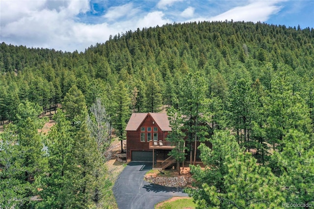 1321 Forest Edge Rd, Woodland Park, CO 80863 - view from above of property with a forest