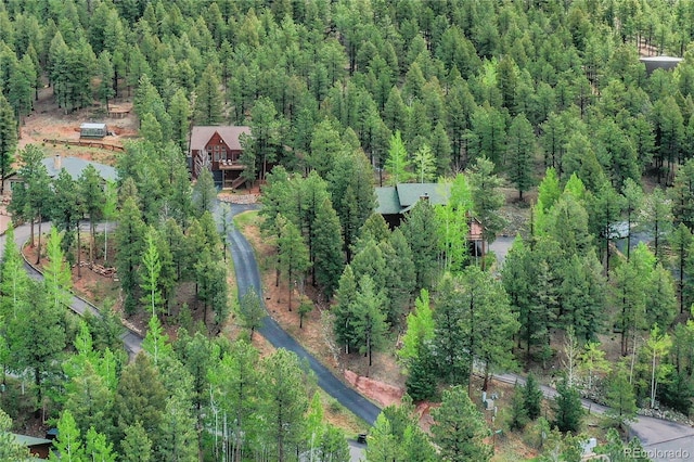 1321 Forest Edge Rd, Woodland Park, CO 80863 - aerial overview of property's location featuring a heavily wooded area