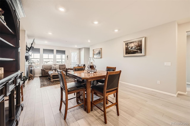 dining room with light wood-type flooring