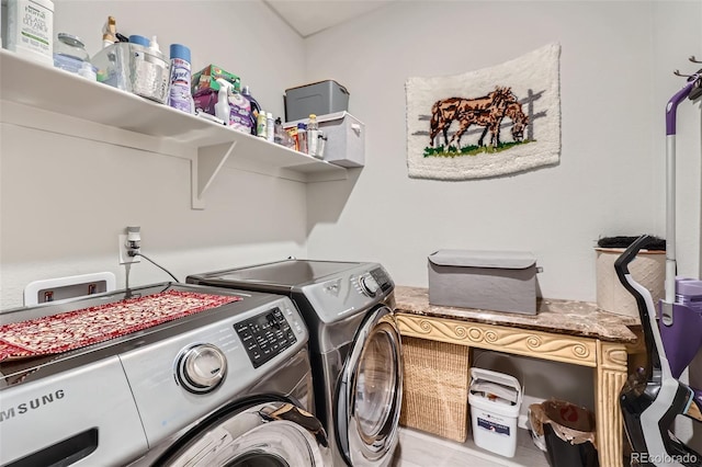 washroom with independent washer and dryer