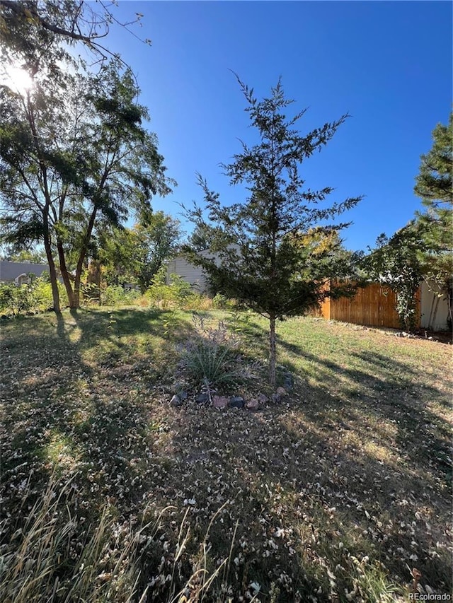 view of yard featuring fence