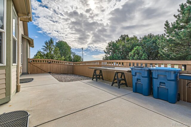 view of patio / terrace with a jacuzzi