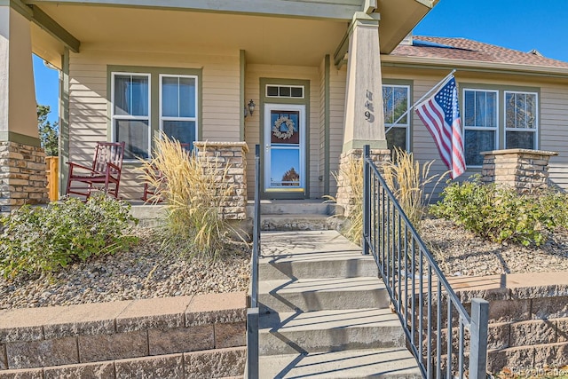 entrance to property with covered porch