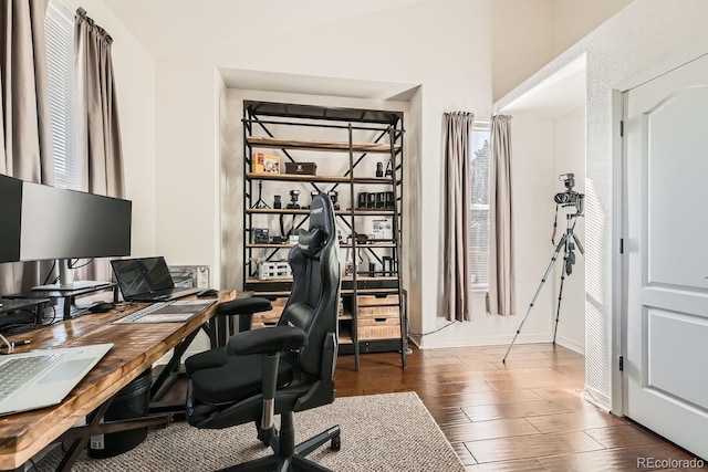 office space featuring dark wood-type flooring