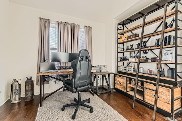 office space with dark wood-type flooring