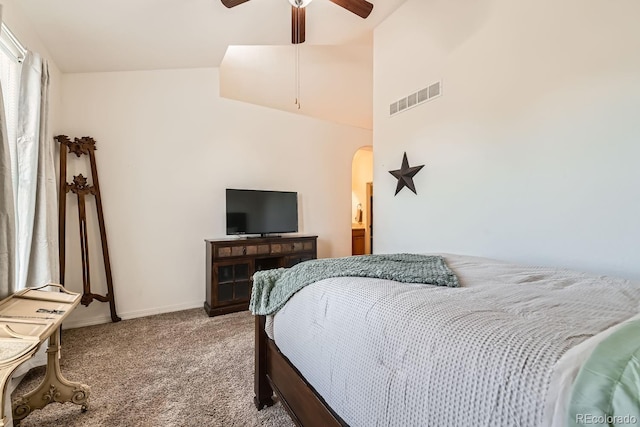 carpeted bedroom featuring high vaulted ceiling and ceiling fan