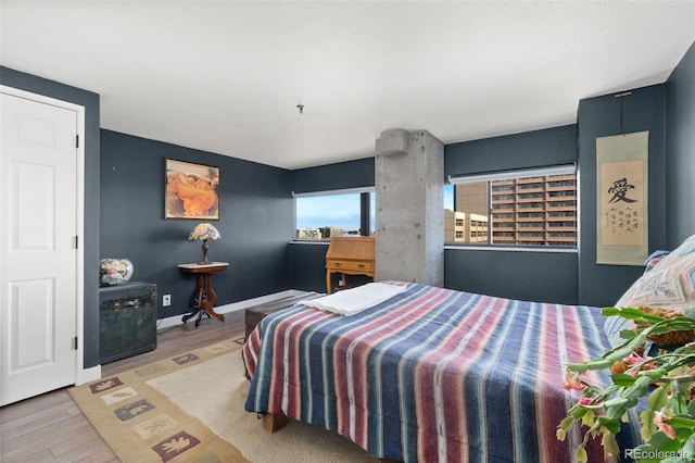 bedroom with light hardwood / wood-style floors