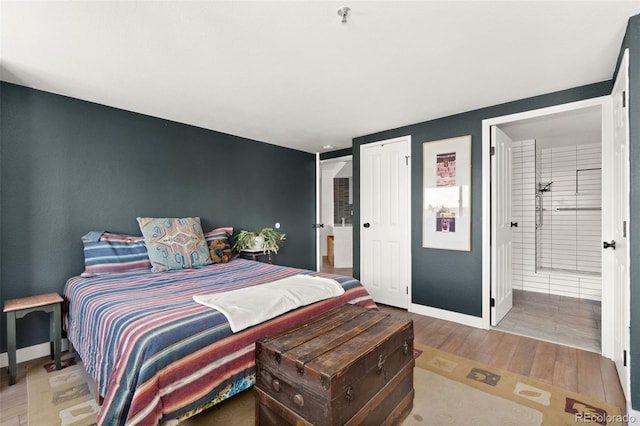 bedroom with light hardwood / wood-style floors