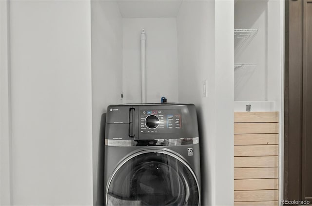 laundry room with washer / clothes dryer