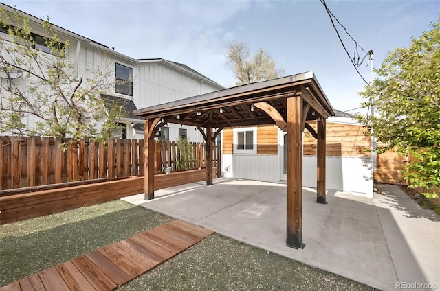view of patio / terrace with a gazebo and fence