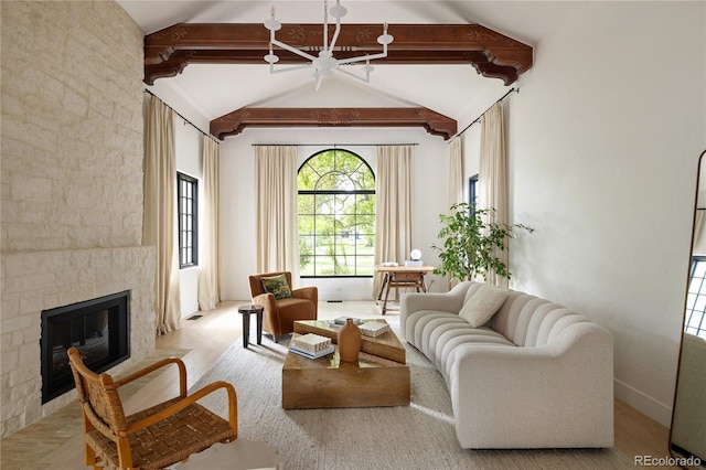 5800 E 6th Avenue Parkway, Denver, CO 80220 - living area featuring beamed ceiling, a large fireplace, and high vaulted ceiling