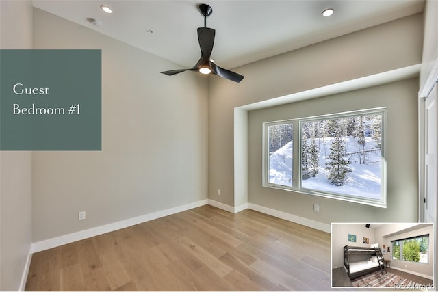 unfurnished room featuring ceiling fan and light hardwood / wood-style flooring