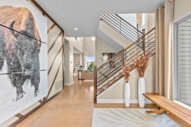 481 Meadowleaf Ln, Highlands Ranch, CO 80126 - entryway with stairway, wood finished floors, recessed lighting, and baseboards