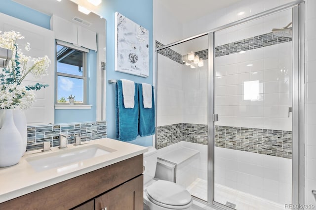 481 Meadowleaf Ln, Highlands Ranch, CO 80126 - bathroom with toilet, a shower stall, and vanity
