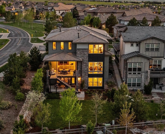 481 Meadowleaf Ln, Highlands Ranch, CO 80126 - back of house featuring a residential view, stairs, and a tiled roof