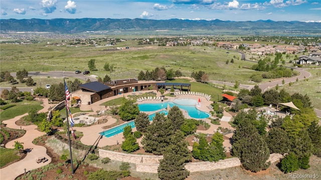 481 Meadowleaf Ln, Highlands Ranch, CO 80126 - drone / aerial view of a pool and mountains