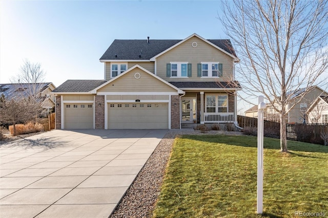 view of front of property with driveway, brick siding, covered porch, fence, and a front yard