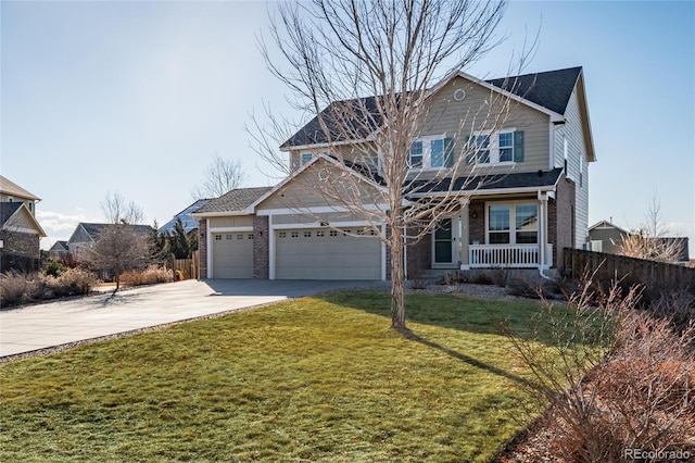 traditional home featuring driveway, a porch, an attached garage, a front lawn, and brick siding