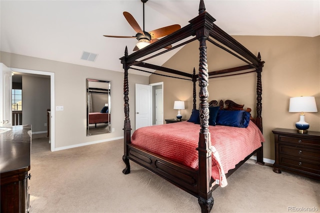 carpeted bedroom featuring lofted ceiling, a ceiling fan, visible vents, and baseboards