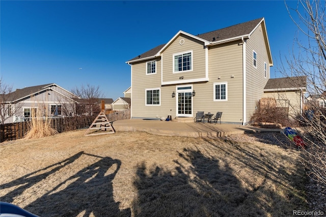 back of house with a patio area and fence