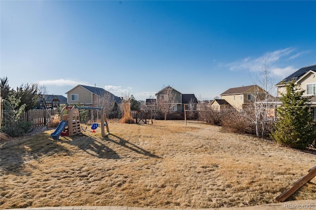 view of jungle gym with fence