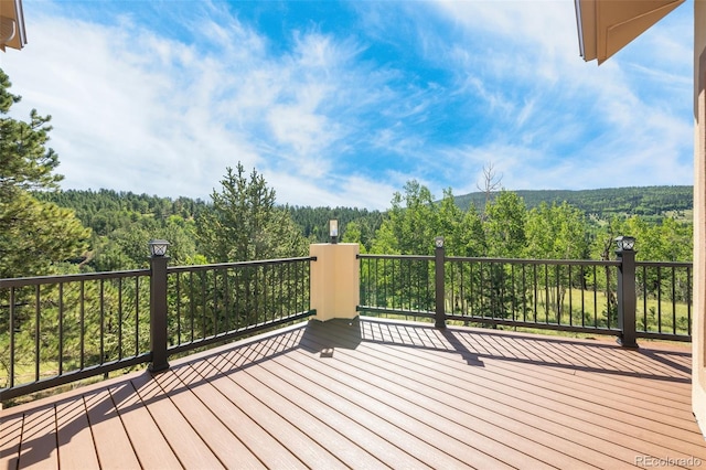 deck with a wooded view
