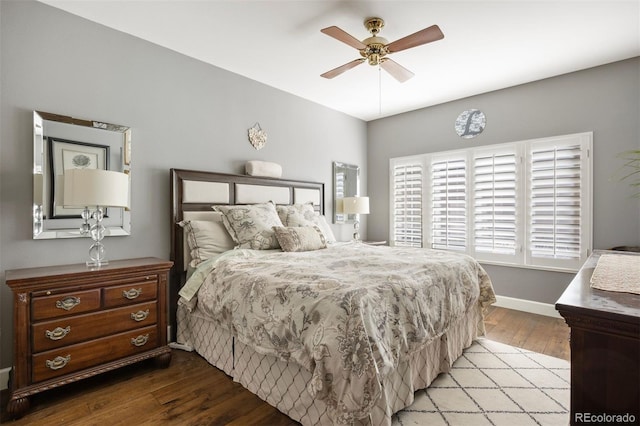 bedroom with ceiling fan and light hardwood / wood-style floors