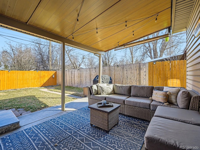 view of patio with a fenced backyard and an outdoor living space