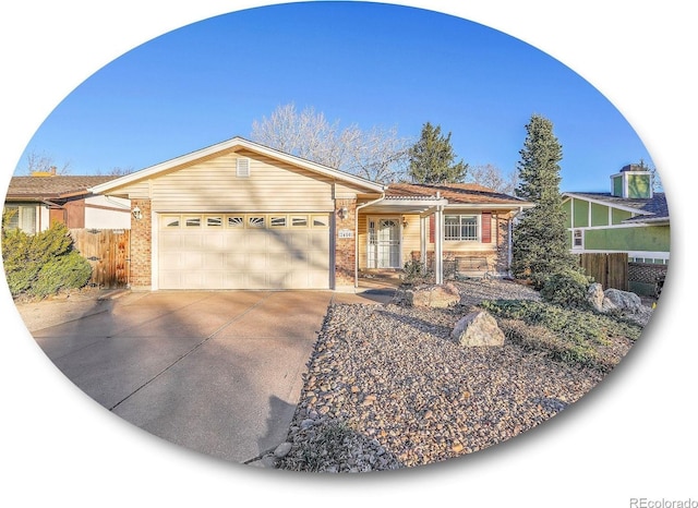 ranch-style home featuring a garage