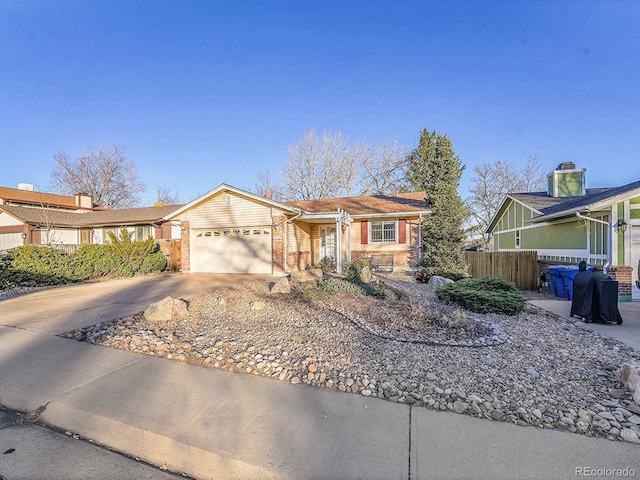 ranch-style house featuring a garage