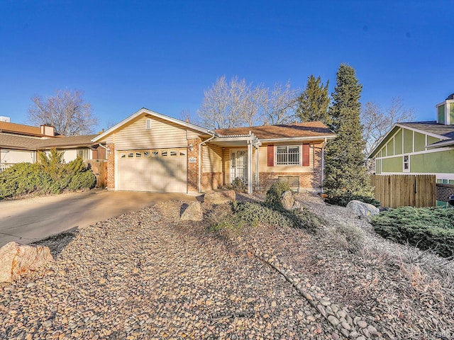 ranch-style house featuring a garage