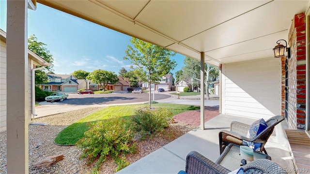 941 E 130th Cir, Thornton, CO 80241 - covered porch with a residential view