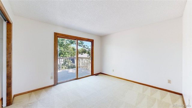 941 E 130th Cir, Thornton, CO 80241 - empty room with light colored carpet and a textured ceiling