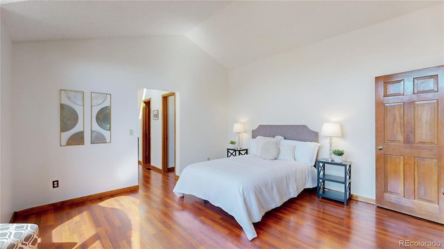 941 E 130th Cir, Thornton, CO 80241 - bedroom with wood finished floors and vaulted ceiling