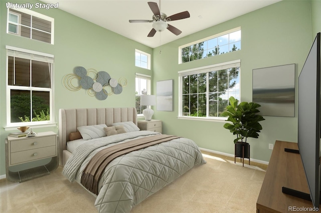10597 Ashfield St, Highlands Ranch, CO 80126 - carpeted bedroom with a high ceiling and ceiling fan