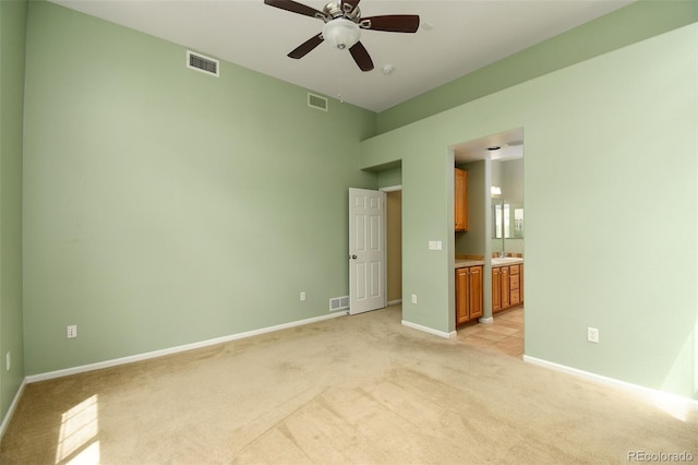 10597 Ashfield St, Highlands Ranch, CO 80126 - spare room with light colored carpet and ceiling fan