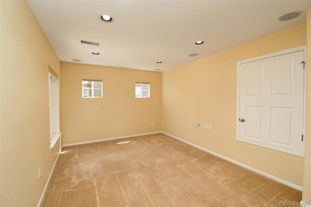 10597 Ashfield St, Highlands Ranch, CO 80126 - empty room with light colored carpet and recessed lighting