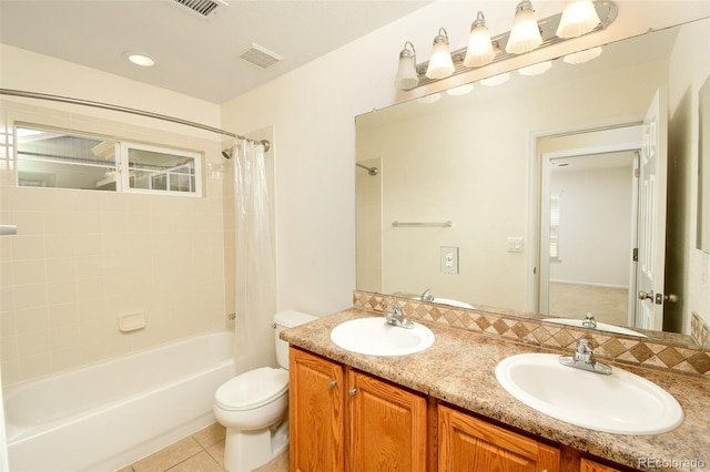 10597 Ashfield St, Highlands Ranch, CO 80126 - bathroom with double vanity, shower / tub combo with curtain, and tile patterned floors